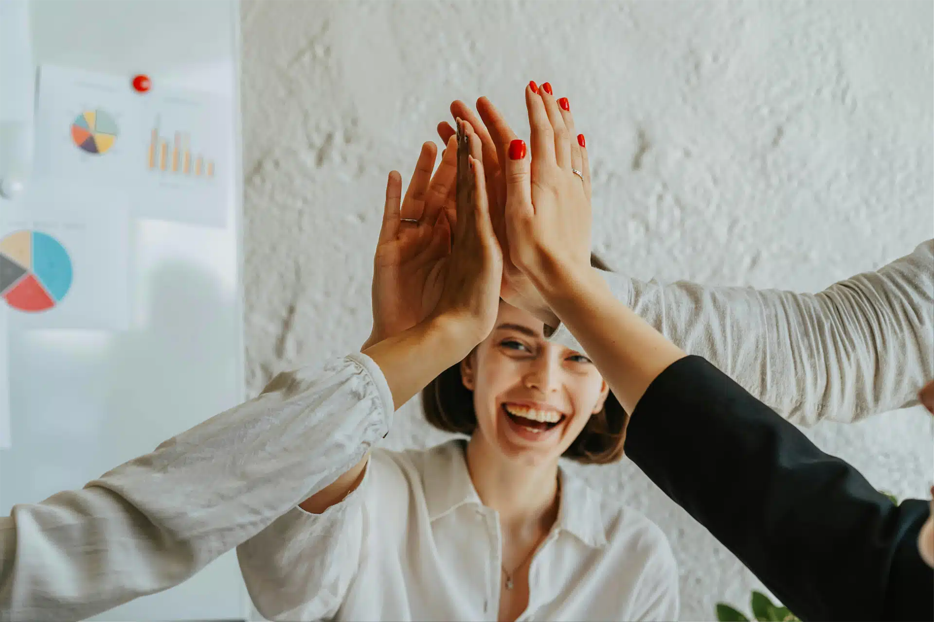 Happy employee celebrating workplace achievement