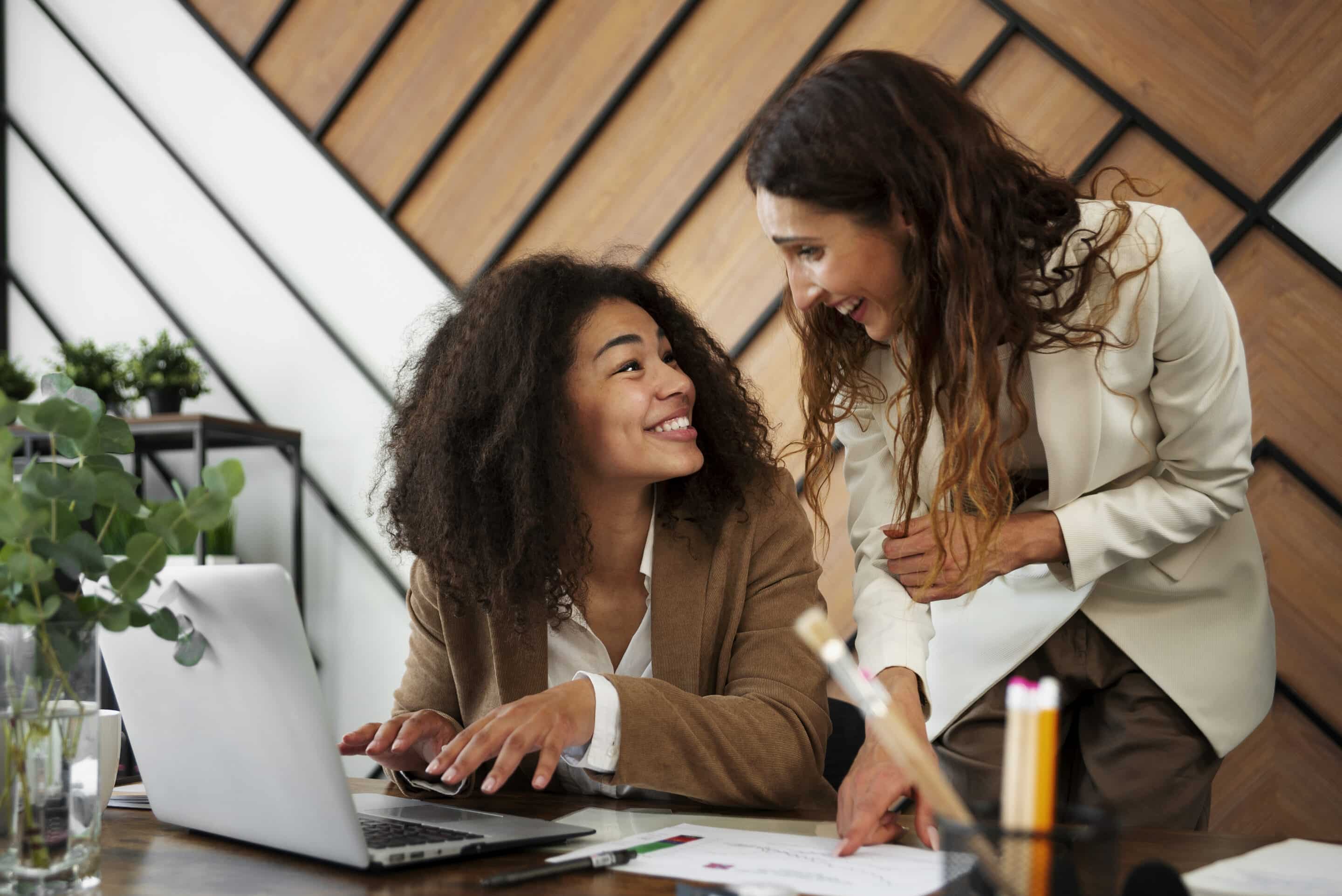 People working together in a bright, cosy office People working together in a bright, cosy office