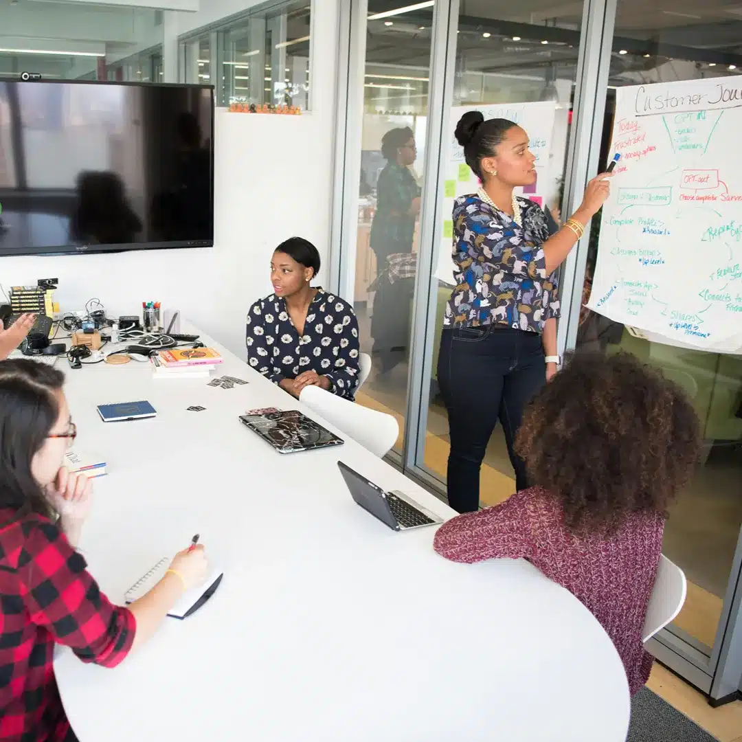 Diverse team collaborating in inclusive meeting space